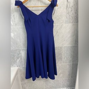 Royal blue dress with bow shoulders and pockets